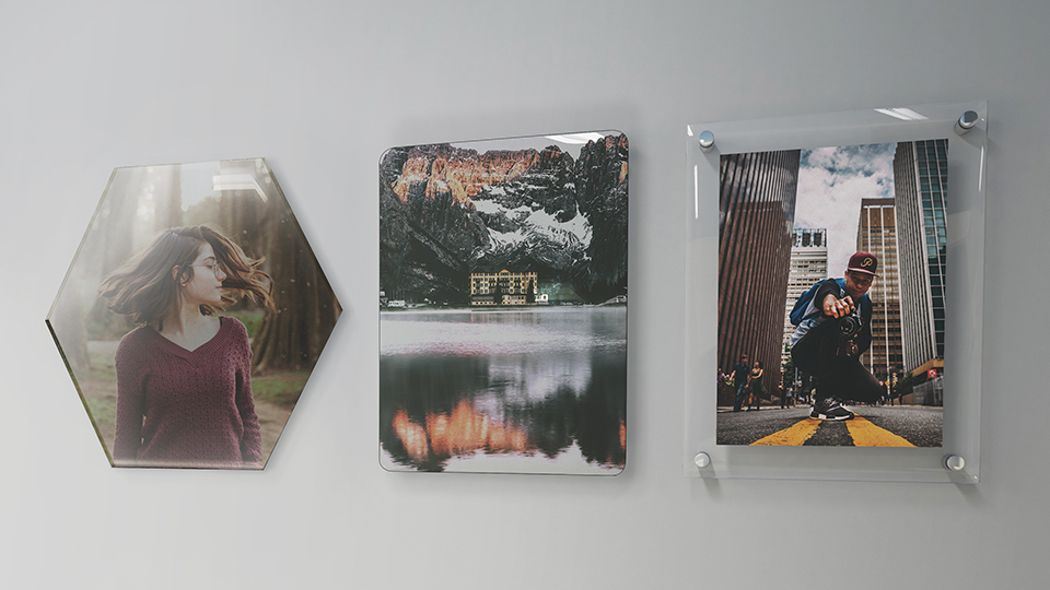 Acrylic prints with different edges and mounting options on an interior wall